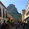 A busy Sunday afternoon in Bernal with its "Pe&ntilde;a" looming in the background