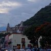 A view of La Capilla de San Miguel on the hill in Atlixco, with Popo in the background.