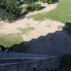 Looking down at the steep descent to come.